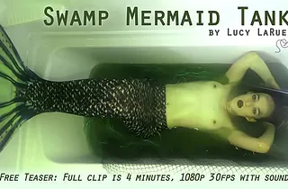 Lucy LaRue plays the commerce of a Hold back Mermaid Tank in a super-hot solo have game