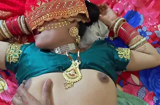 Beautiful Indian couple engaged in passionate bedroom activities