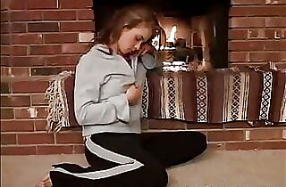 Little April with inborn globes Fingerblasting beside fire place