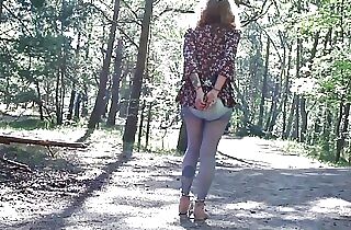 Handcuffed girl ambles in the woods with the hitachi inwards her diaper